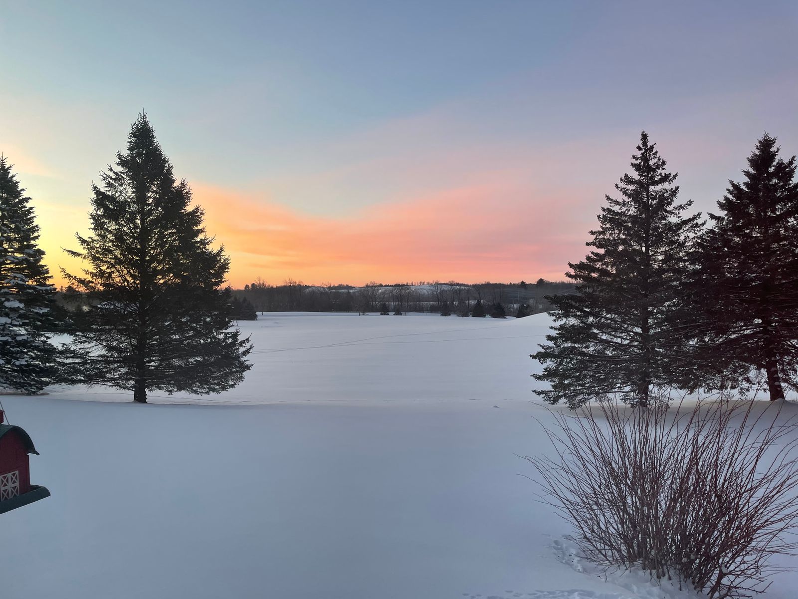 Wisconsin snowfall at sunset